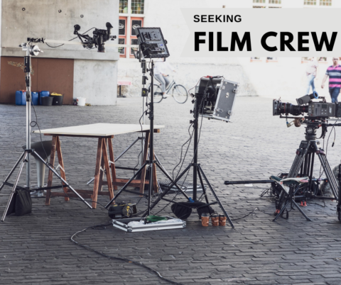 Image of a film set. Text reads, Seeking film crew.