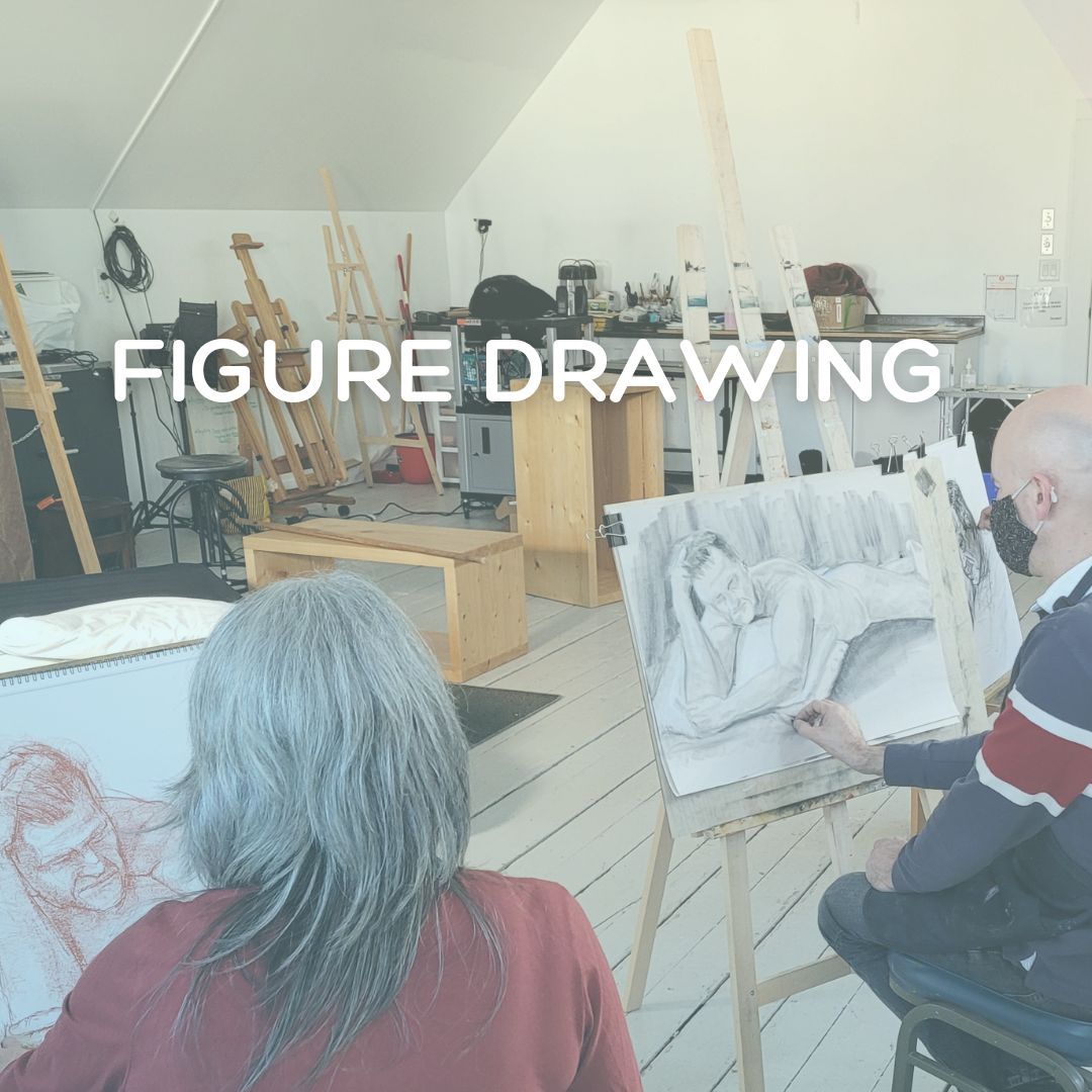 Artists drawing in a studio at easels.