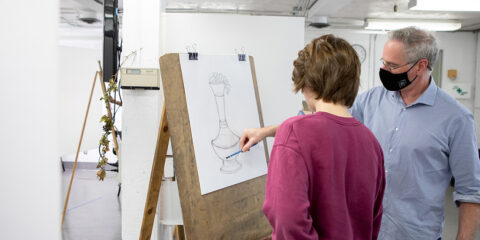 An NBCCD instructor gives a drawing demonstration.