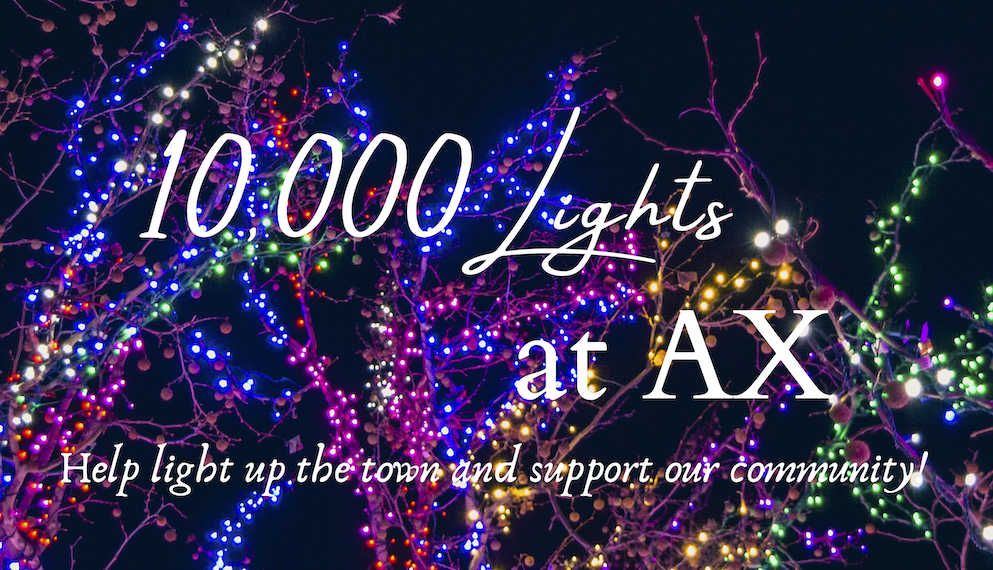 Image of Christmas lights. Text reads: 10,000 Lights at the AX. Help light up the town and support our commitment.