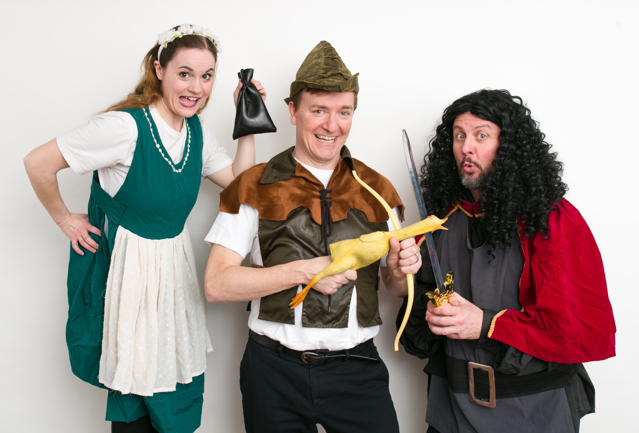 Actors from Robin Hood dressed as Maid Marion, Robin Hood, and the Sherif of Nottgham