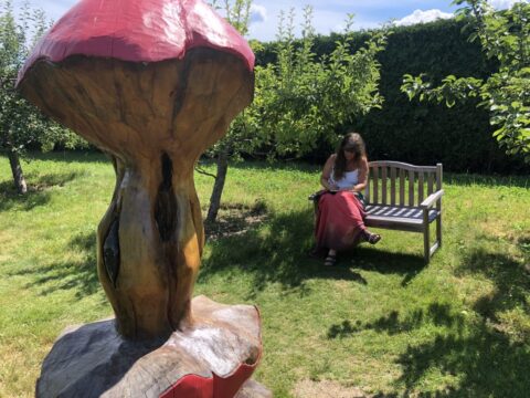 A mushroom sculpture in the garden at KIRA