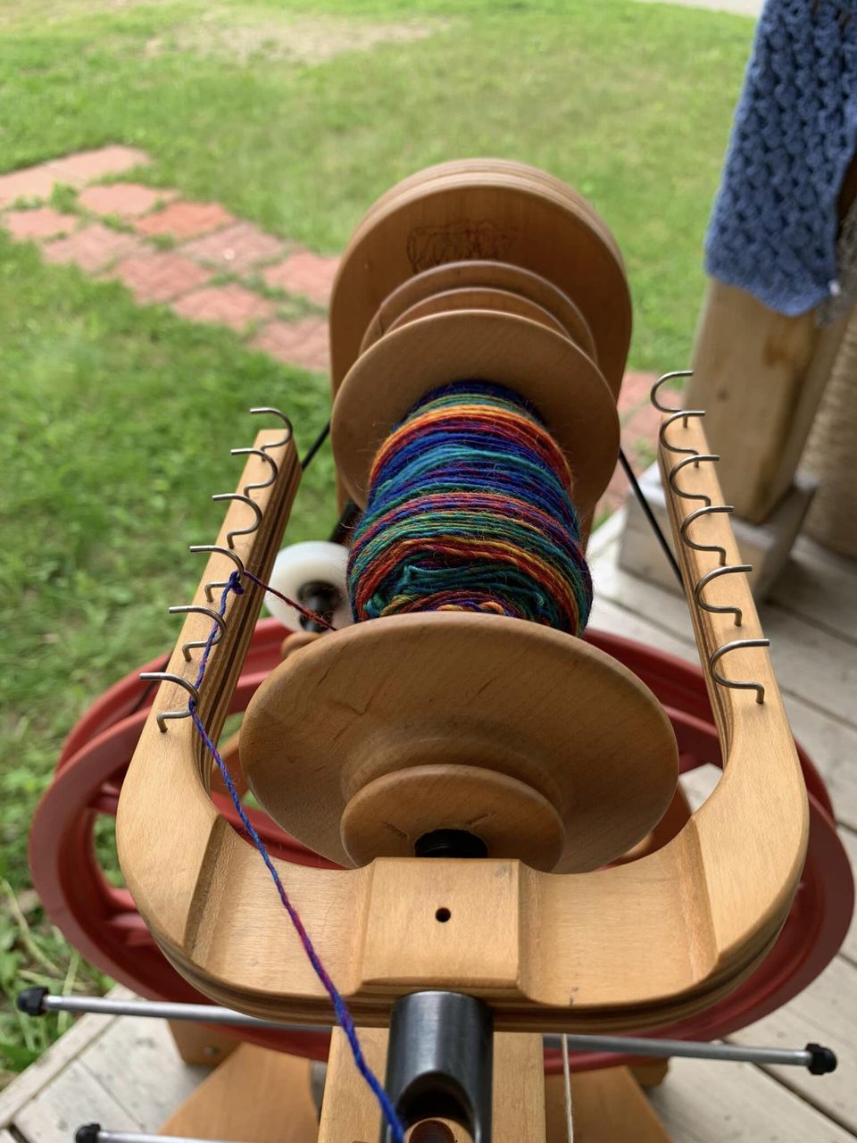 An image of colourful yarn being spun.